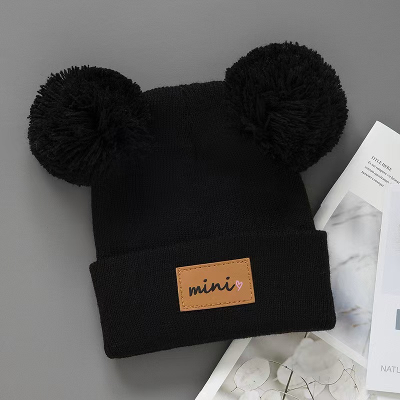 bonnet tricoté pour nouveau-né