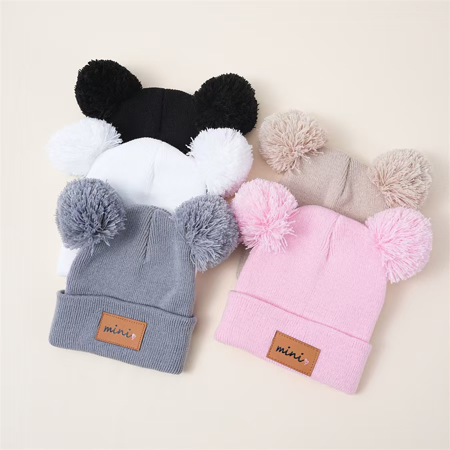 bonnet tricoté pour nouveau-né
