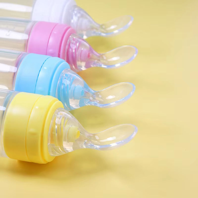 Biberon  alimentaire et cuillère d'entraînement pour nouveau né